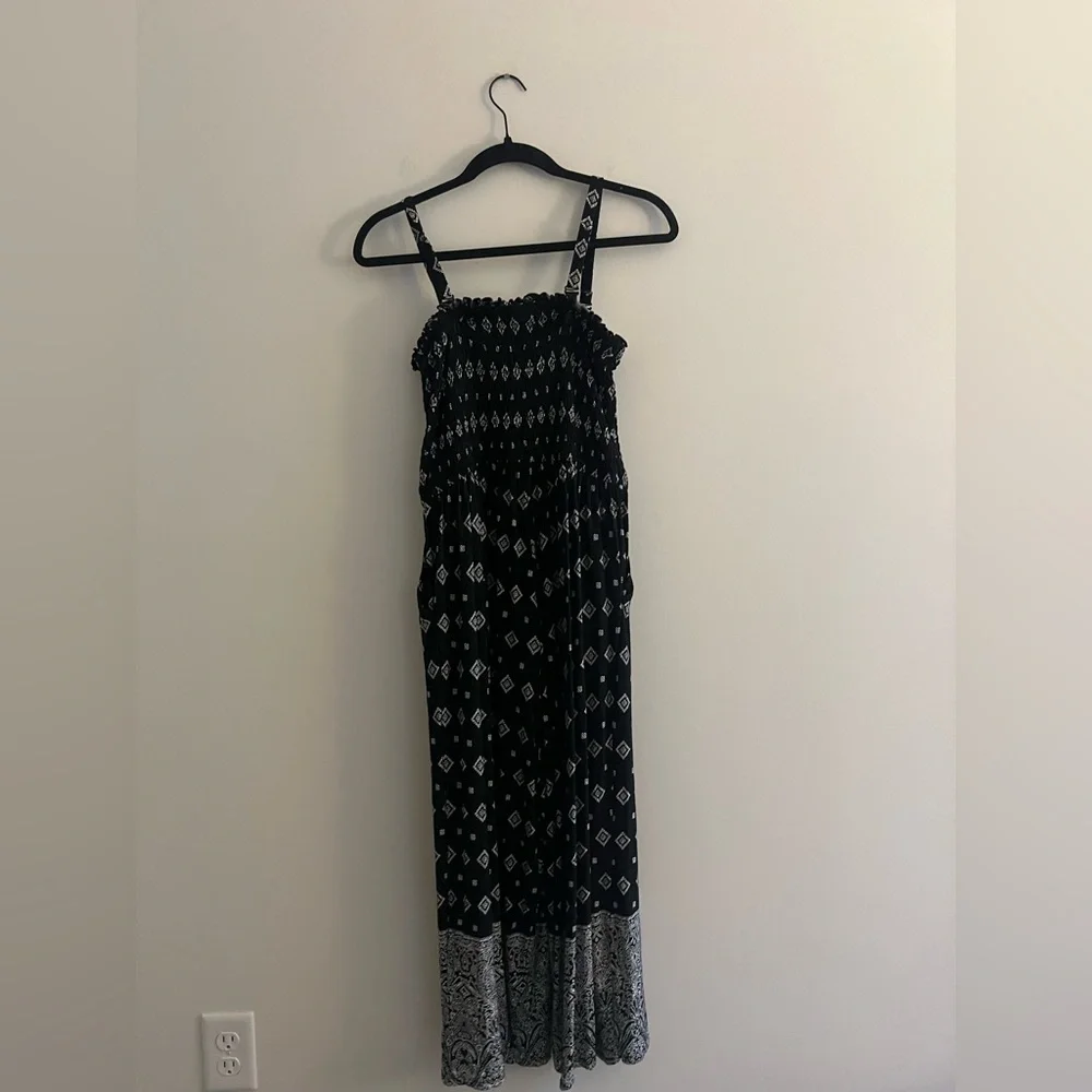 Torrid Super Soft Black Border Print Smocked
Culotte Jumpsuit Size 0 - Picture 6 of 7